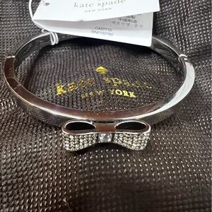 NWT - Kate Spade silver bangle bracelet with rhinestone bow
